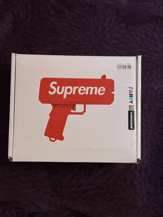 Пістолет для грошей SUPREME Money Gun (золотистий) Aurora