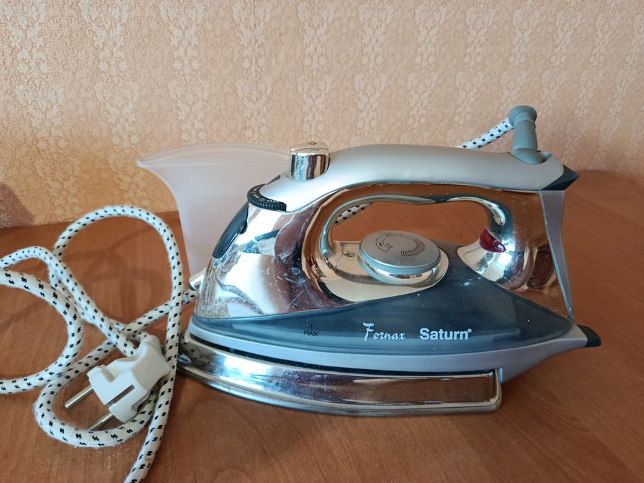 Продам      утюг
