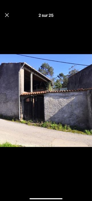 Casa com dependência e terreno