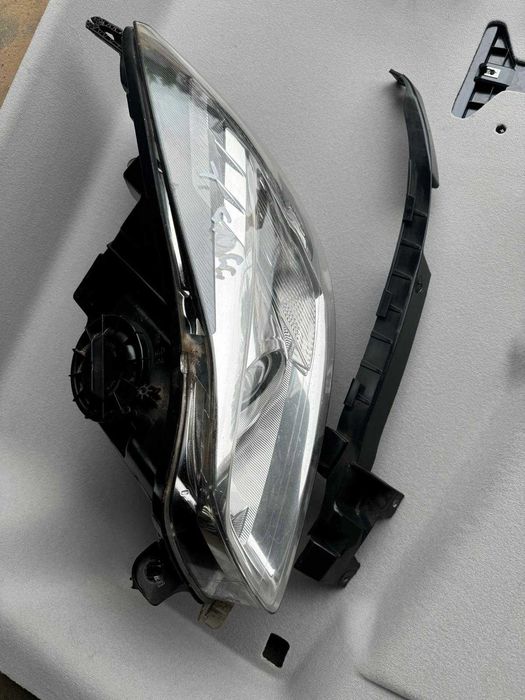 Lampa ksenon lewa Opel Insignia A europa goła bez osprzętu
