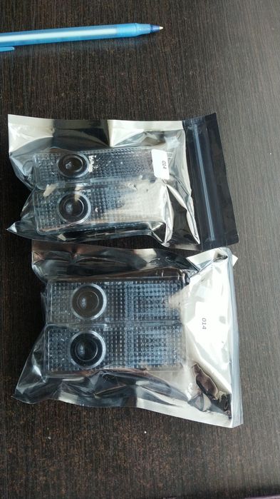 Подсветка дверей с логотипом БМВ