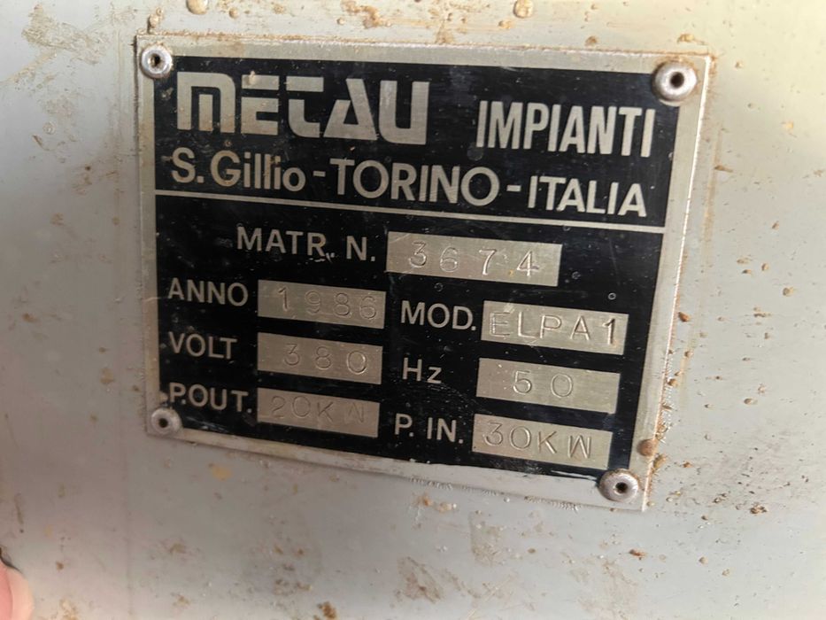 Prasa na gorąco z dociskiem bocznym Metau Impianti - włoska