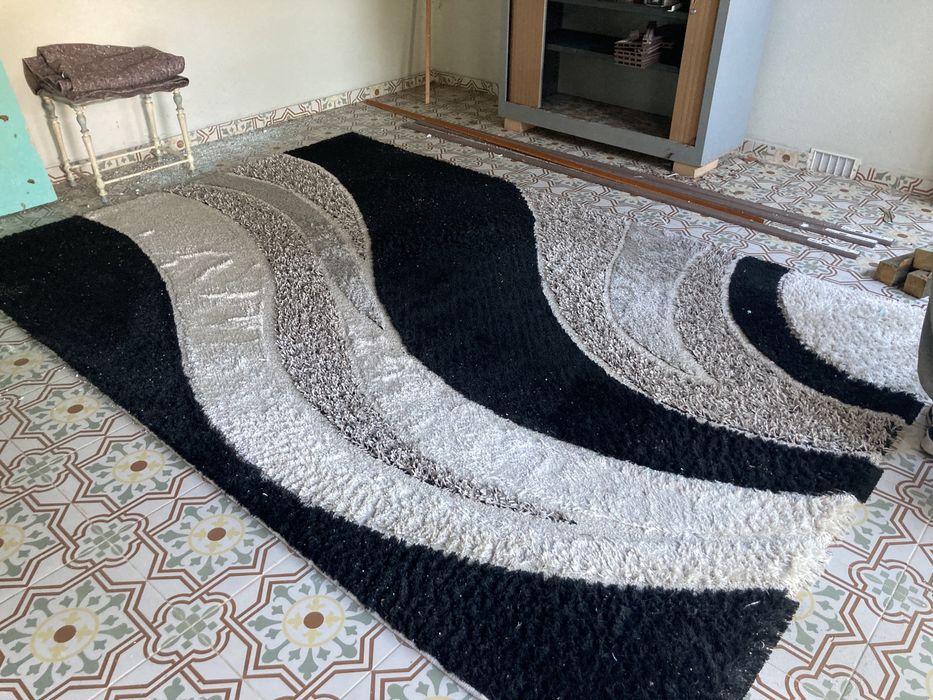 Tapete de sala em bom estado