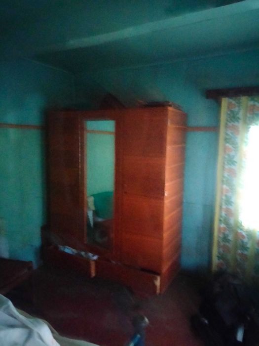 Земельна ділянка з будинком та прибудовами