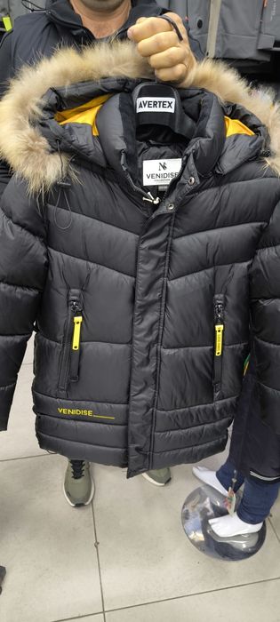 Продам пуховик теплый