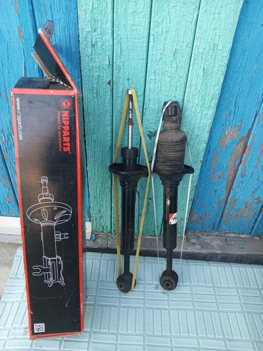 Задние амортизаторы Мазда 121
