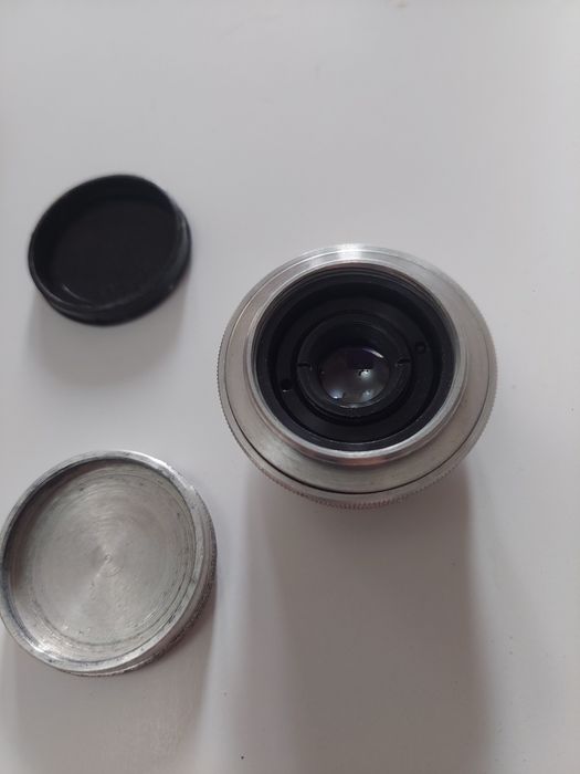 Лот с обьективом индустар и фотоаппаратом