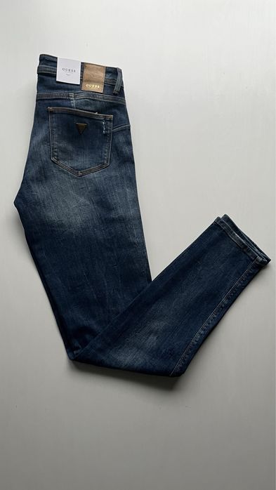 Guess niebieskie jeansy z dziurami W81AJ2D2ZI0 25 L30
