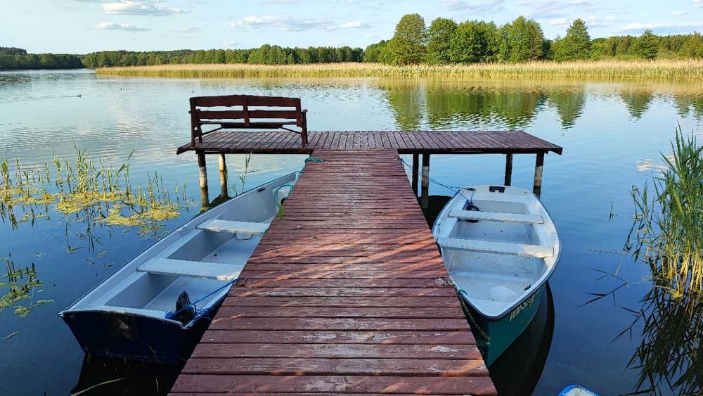 Dom do wynajęcia nad jeziorem - Pasym - pomost - łódka - rower wodny