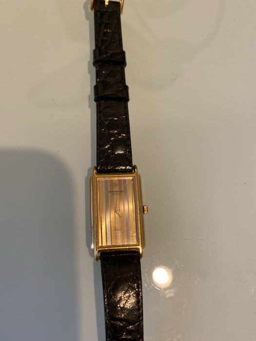 Relogio  de marca  RAYMOND WEIL  de senhora muito delicado, caixa