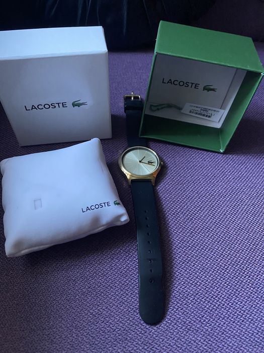 Zegarek Lacoste w kolorze złotym i czarnym paskiem