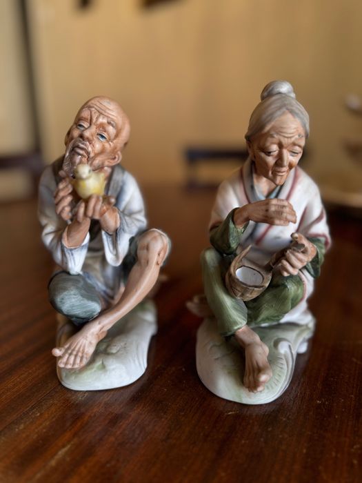 Oriental porcelain elderly couple