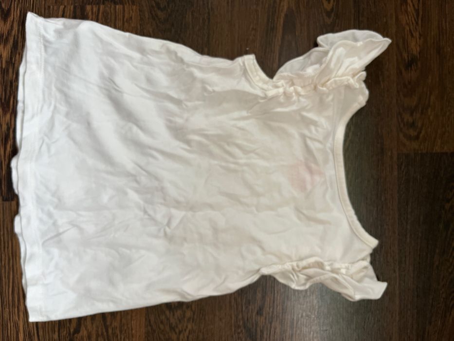 Biały t-shirt dziewczęcy bez rękawów r.92