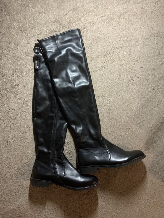 Високі сапоги