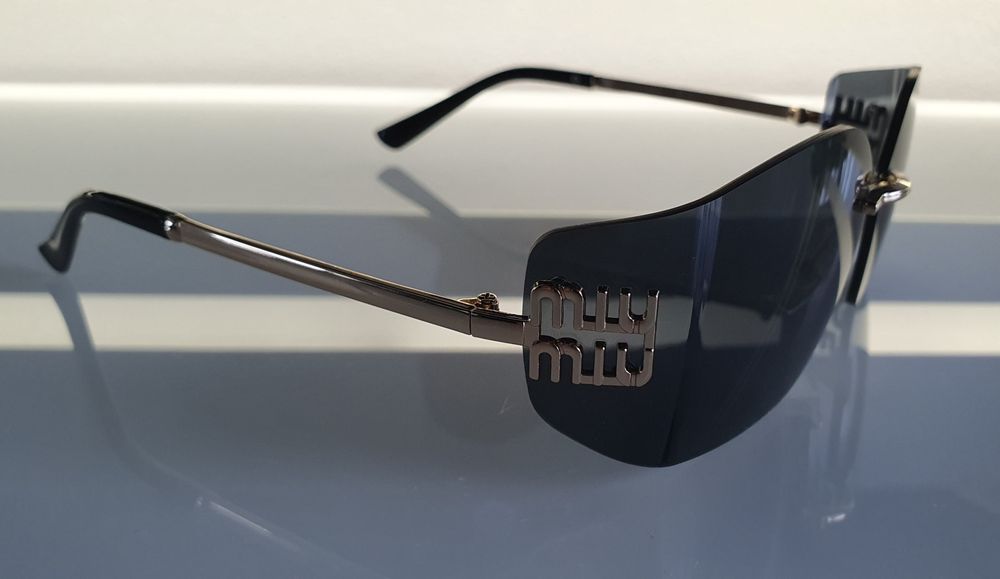 Okulary damskie Miu Miu