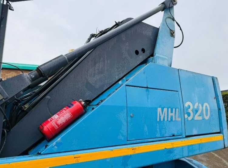 Екскаватор для перевалки лісу , металолома FUCHS MHL 320