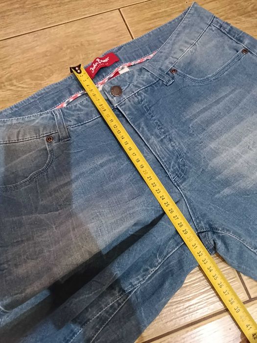 Spodnie 7/8 jeansy damskie niebieskie 44
