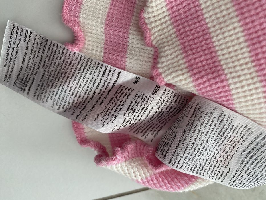 Bluzka z kokardą w paski 104