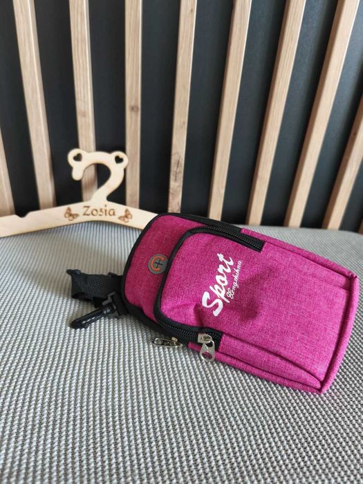 Mała torebka saszetka wyjście na słuchawki różowa na telefon sportowa