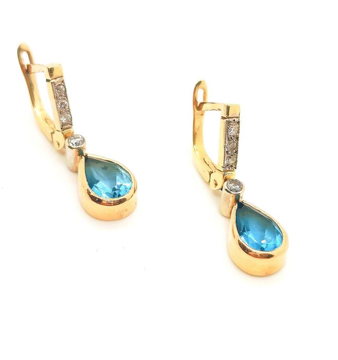 Złote kolczyki wiszące z Topazami i diamentami 0,12ct Pr.585 W:4,18gr