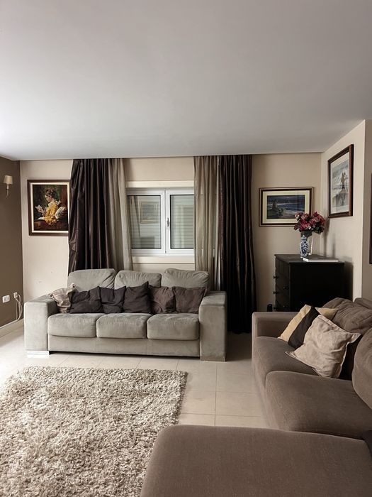 Sofá cinza pele de pessego