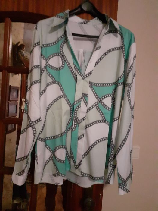 Camisa completamente nova.