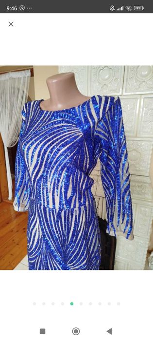 Шикарна вечірня сукня розшита паєтками