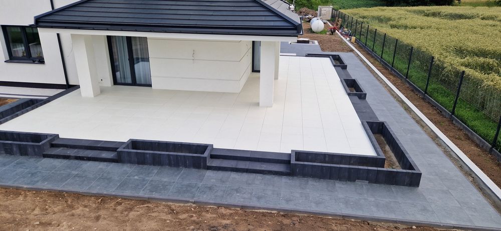 Uslugi Brukarskie, Układanie kostki brukowej