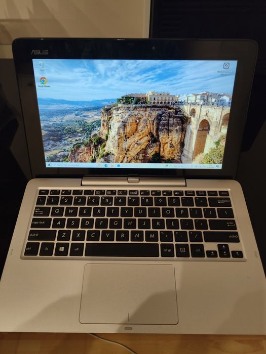 Sprzedam laptop/tablet 2w1 ASUS Transformer Book T200TA. Ekran odłącza się od klawiatury i działa jako samodzielny tablet z Windows.