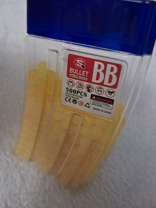 Żółte pomarańczowe kulki do zabawkowego pistoletu dla dzieci zabawki