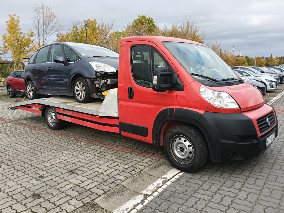 Pomoc drogowa 24/7 holowanie transport maszyn  wulkanizacja