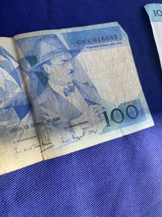 7 Notas de 100 escudos
