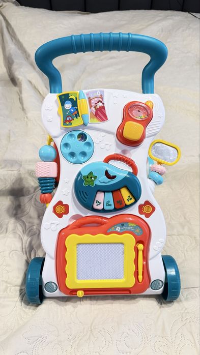 Дитячі ходунки, музична каталка