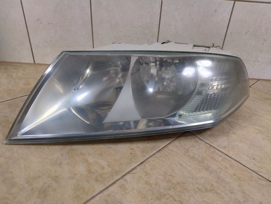 Skoda Octavia 2 II lampa reflektor lewy przód Europa oryginał wysyłka