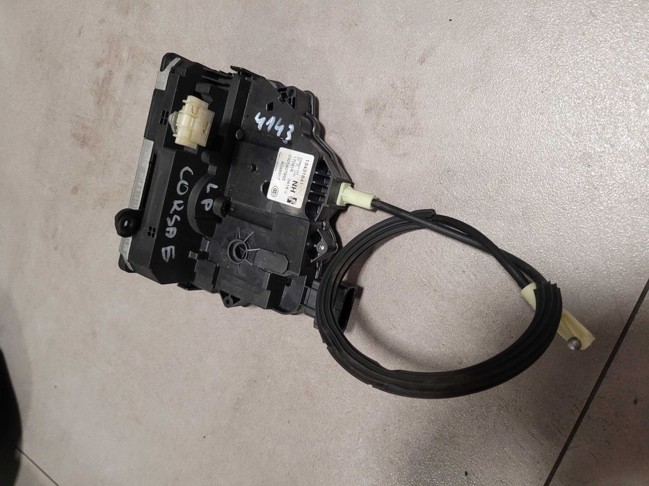 Zamek drzwi lewy przód lewy przedni Opel Corsa E 134.318.41 6-PIN