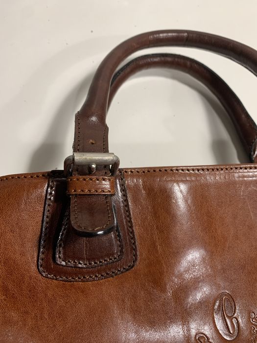 Mala castanha em pele ceancarel