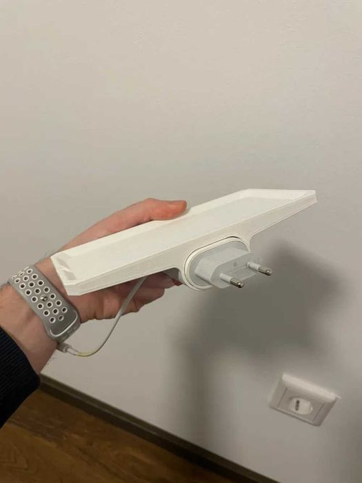 Base para carregar iPhone na tomada