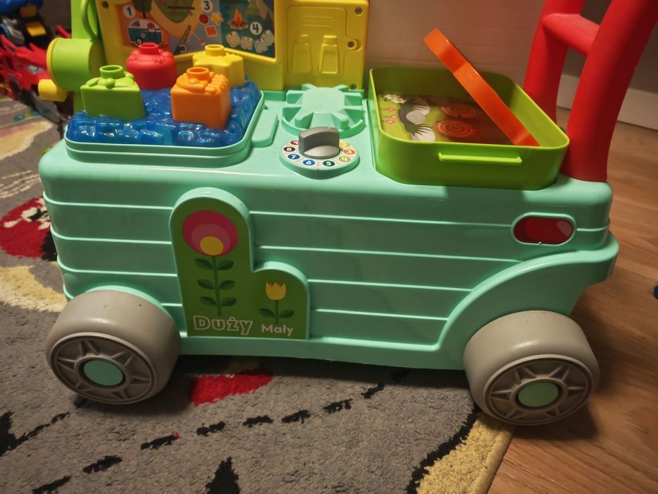 Fisher Price Wesoły Kamper Malucha pchacz jeździk grający