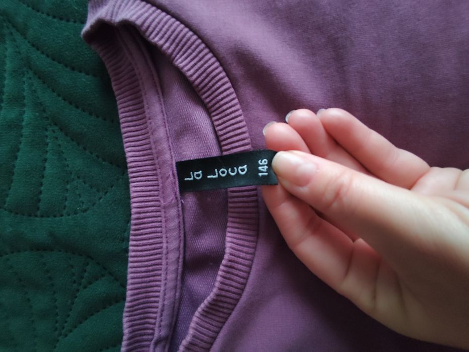 Bluza dziewczęca z ozdobną falbaną r 146