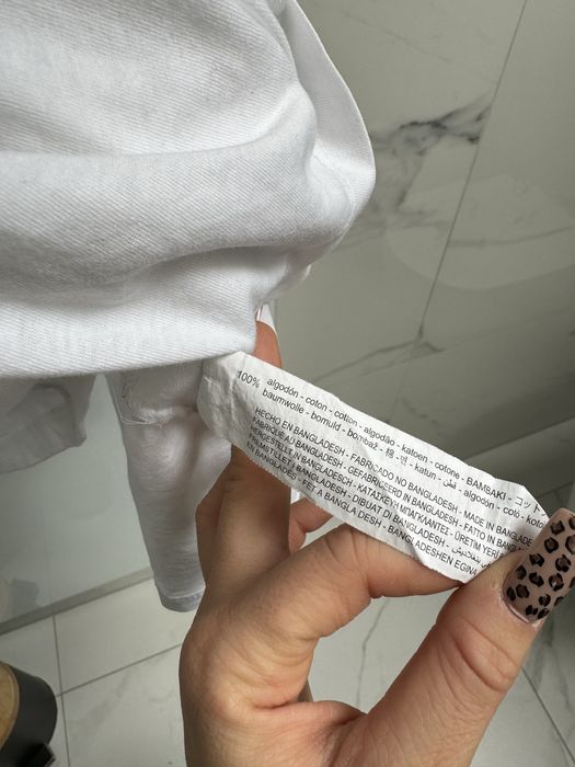 Biała koszulka z falbankami damska