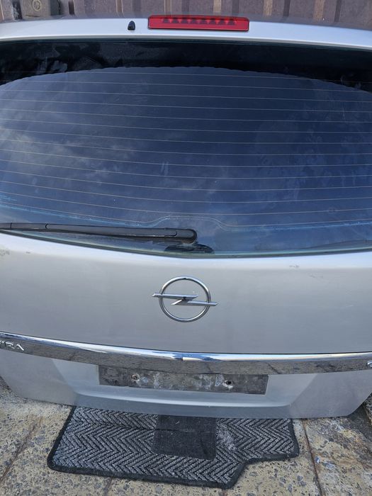 Кришка багажника Opel Zafira b кляпа Ляда замок скло Зафіра Зафира