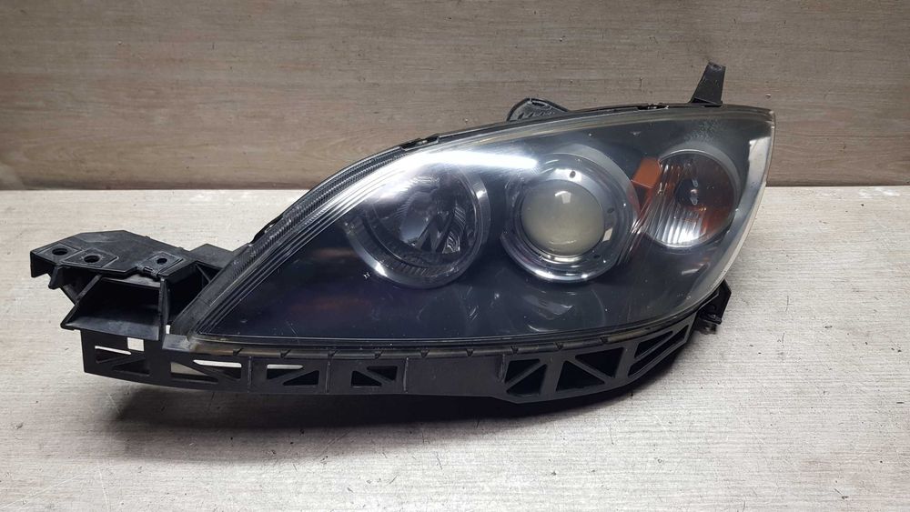 Фара ліва Mazda 3 BK 2003-2009p. Stanley Європа