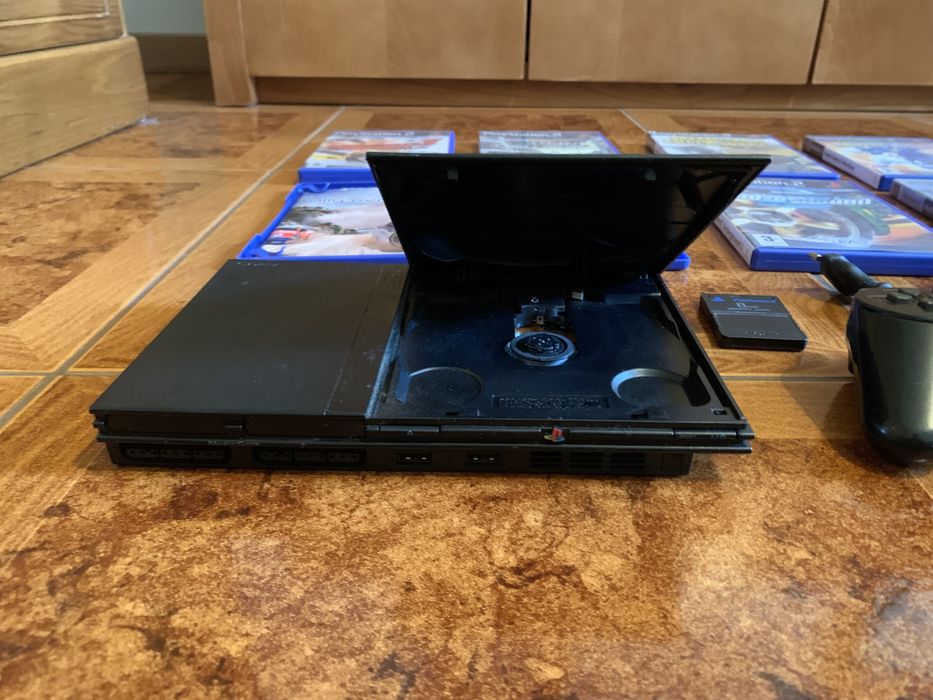 PlayStation 2 Slim / Functional – 7 Games / Original Controller and Cables64297944998913121