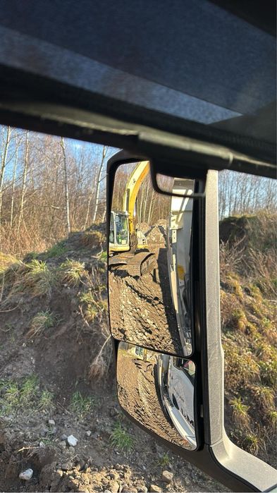 Transport Roboty Ziemne Kruszywa. Koparka Wywrotka Bus