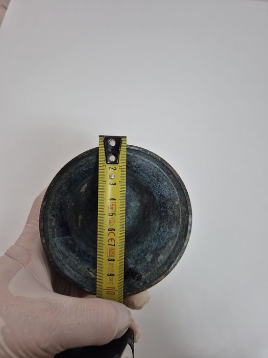 Sino antigo em latão