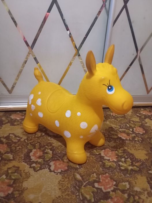 Іграшка пригалка коник б/у
