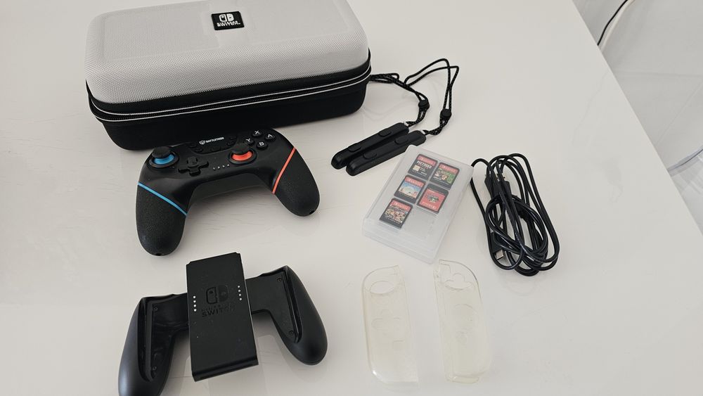 Nintendo switch Oled + 5 jogos tudo como novo