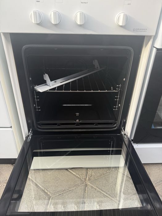 Газова плита з газовою духовкою ширина 55см DGG