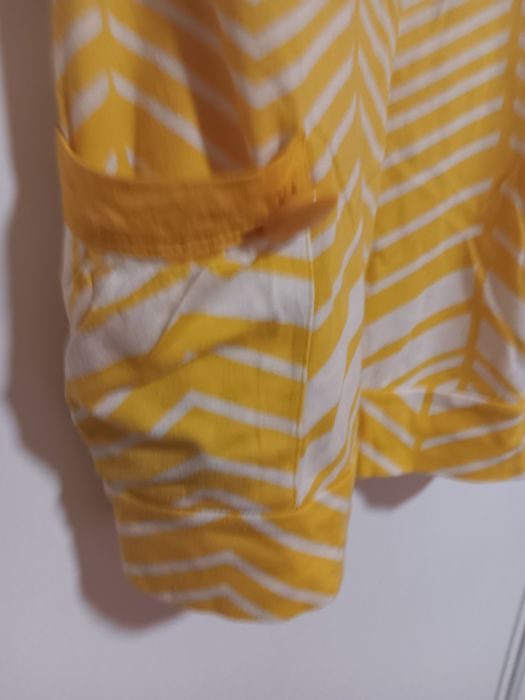 Top amarelo c/ bolsos
