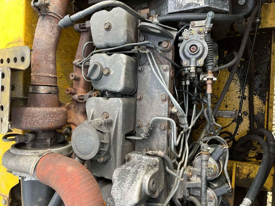 Екскаватор new holland